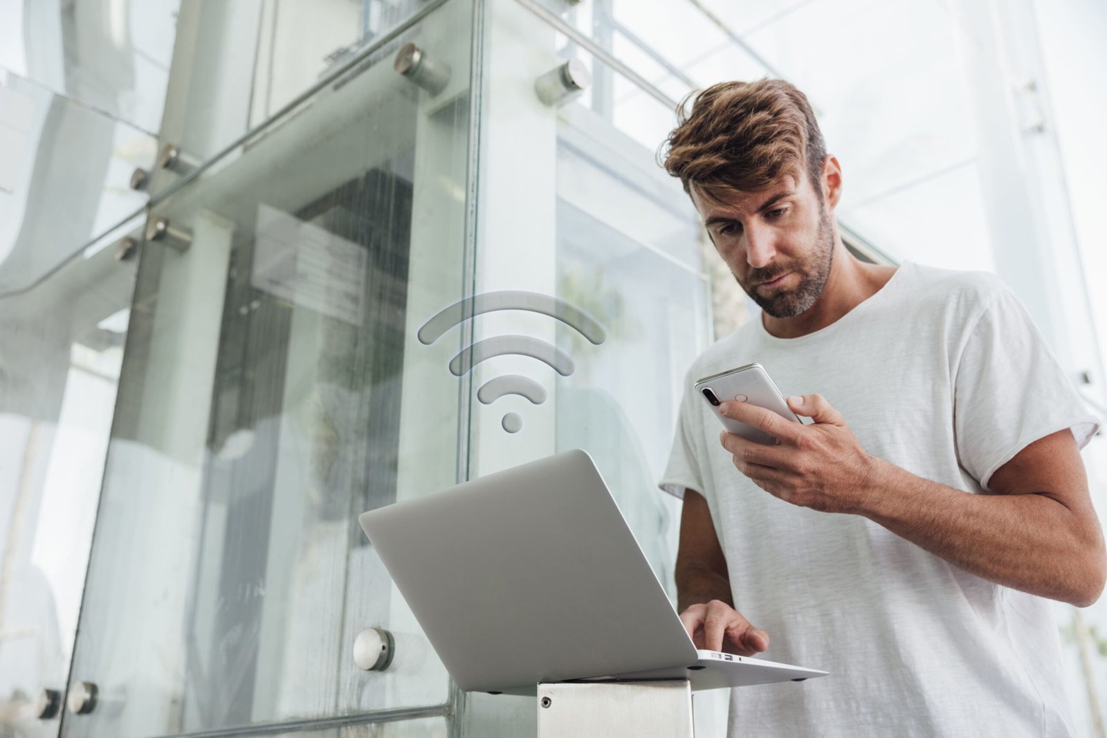 bearded-man-checking-portable-devices (1)